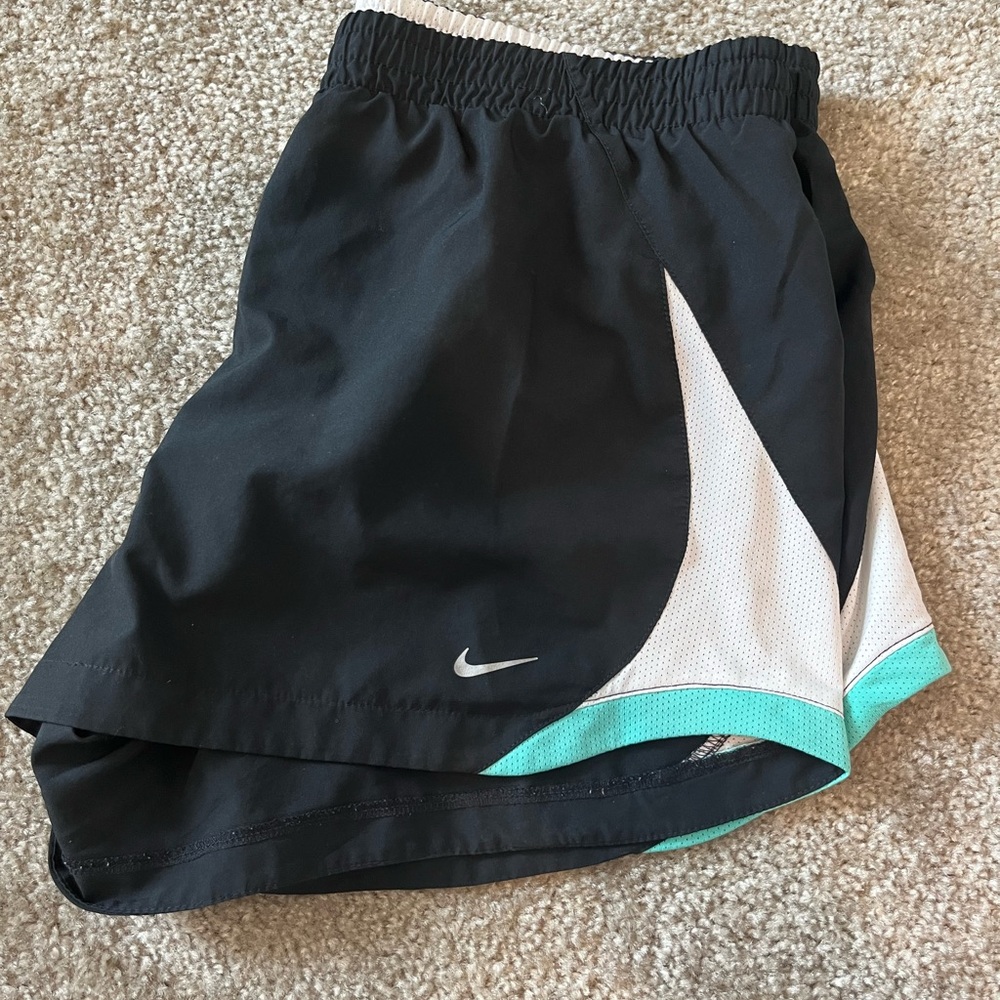 Good condition women’s Nike shorts. Drawstring. Built in underwear. Size L
